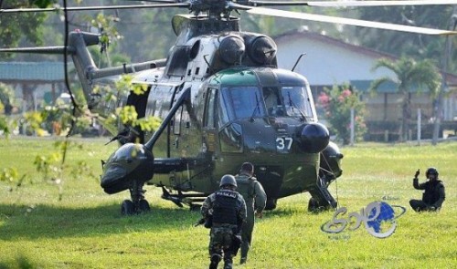 القوات الماليزية تقتل 13 وتطارد مسلحين فلبينيين
