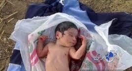 الجهات الأمنية تعثر على ” طفل ” بجانب حاوية للنفايات