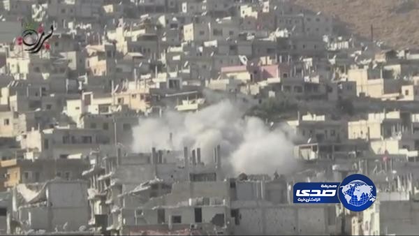 قصف الأسد لحي برزة يدمر ويحرق المنازل