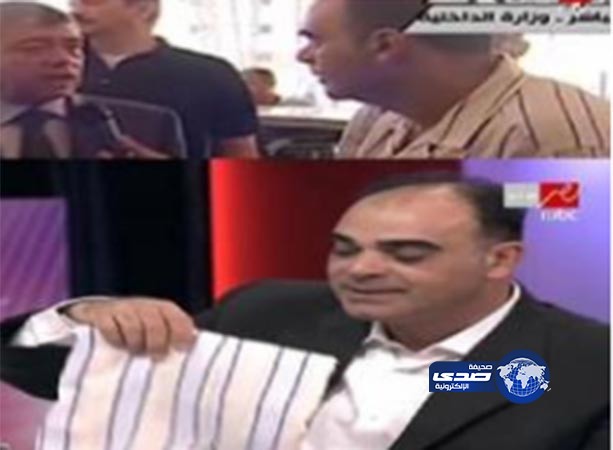 بالفيديو.. “المذيع أبو بيجامة” يظهر في على الهواء مدافعاً عن قميصه الثمين