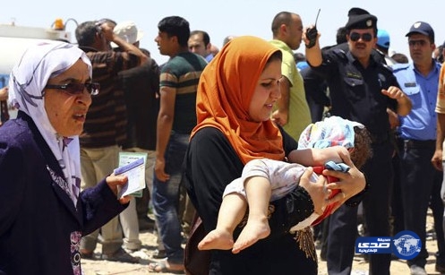 بالصور.. نزوح عراقي جماعي هرباً من داعش