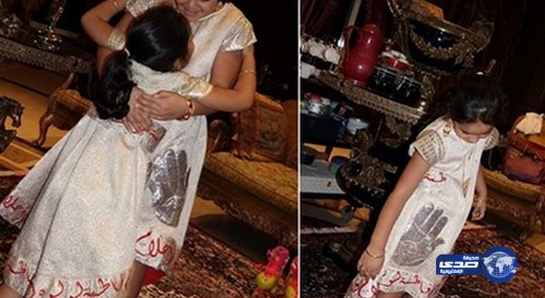 بالصور.. أحلام تكتب اسمها واسماء بناتها على فساتينهن وتثير الاستغراب