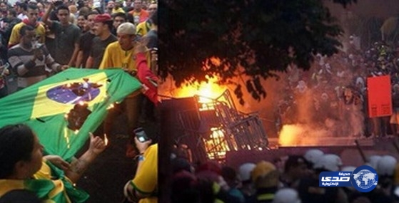 جماهير البرازيل تشعل النيران في الشوارع وعلم بلادها بسبب الخسارة من ألمانيا
