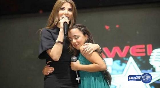 نانسي عجرم تتبنى طفلة