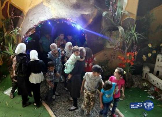 بالصور: مدينة ألعاب تحت الأرض تعيد البهجة لأطفال سوريا