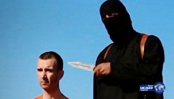 ذباح داعش يكشف عن وجهه ليتوعّد البريطانيين بالقتل