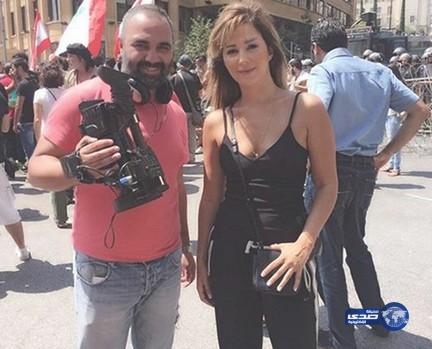 مذيعة لبنانية في تظاهرات القمامة تشعل مواقع التواصل الإجتماعي