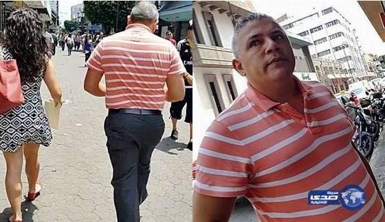 بالفيديو: ضبط رجل أثناء محاولته التقاط فيديو من أسفل فستان امرأة بالشارع