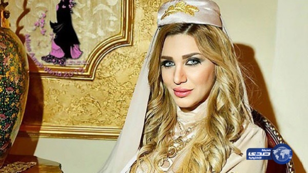 بالصورة: ملكة جمال سورية ترسم تاتو بمكان غريب على جسدها لتدعم بلدها!