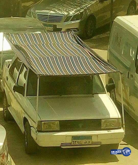حملة سخرية لرجل يضع &#8220;تاندة&#8221; علي سيارته لحمايتها من الشمس