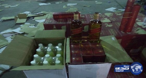 بالصور.. الجمارك تحبط تهريب أكثر من 15 ألف زجاجة خمر ضمن إرسالية “عصير ليمون”