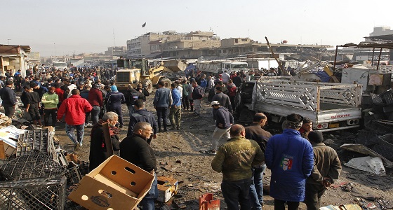 بالصور .. مقتل 14 شخصا وإصابة 57 في انفجارين قرب بغداد