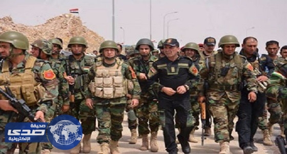 قوات الحشد الشعبي العراقي تحرر قاعدة جوية من مسلحي ” داعش “