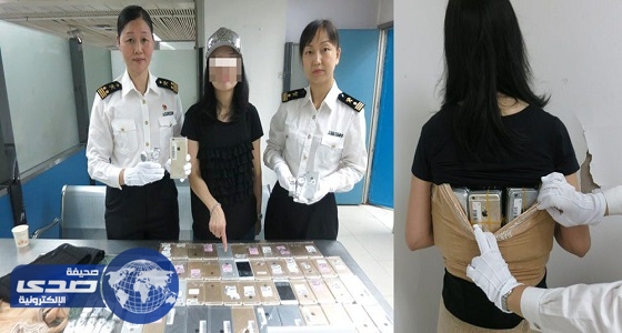 القبض على فتاة صينية حاولت تهريب 102 هاتف iPhone
