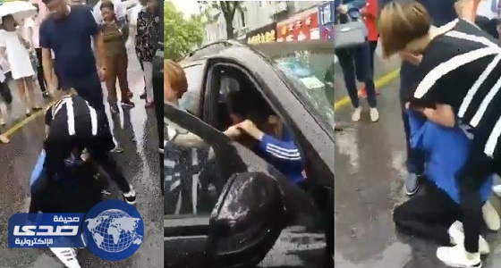 بالفيديو.. امرأة تلقن فتاة ضبطتها بسيارة زوجها علقة ساخنة