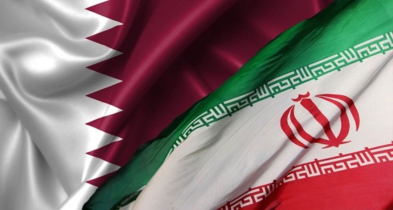 علم إيران يُرفرف على أرض قطر في يومها الوطني..وسياسي: الدوحة تديرها عصابة