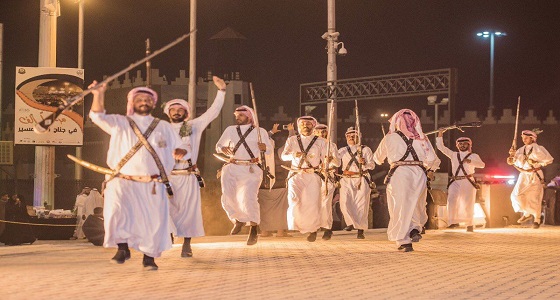 بالصور.. “ مداقيل ” فرقة بلقرن تستوقف زوار قرية عسير في الجنادرية 32