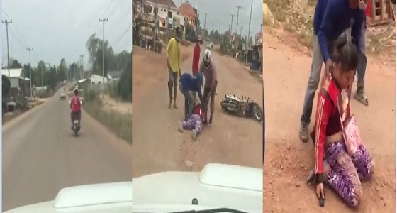 بالفيديو .. رجل يضرب زوجته أثناء قيادته دراجة نارية