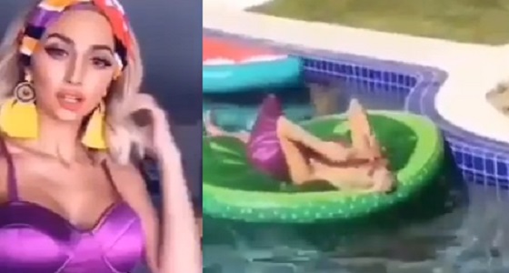 بالفيديو.. جلسة تصوير لمودل روز في حمام السباحة بفستان مكشوف