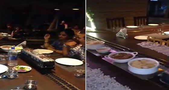 بالفيديو.. مطعم يستخدم قطارا لتوصيل الطعام  لطاولات الزبائن