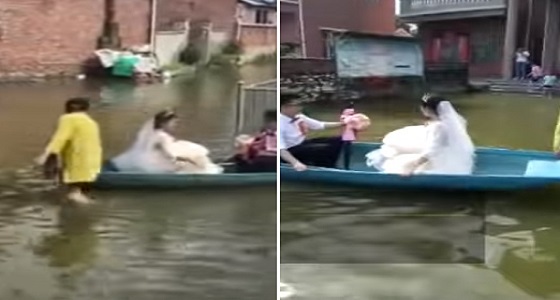 بالفيديو.. عروسان يتحديان الفيضان ويقيمان حفل زفافهما