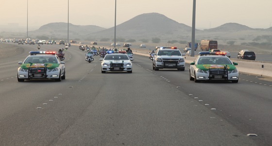 بالصور.. القوات الخاصة لأمن الطرق تحتفل باليوم الوطني الـ88 بمسيرة وطنية