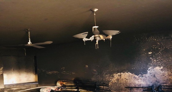 بالصور.. احتجاز وإصابة امرأة وابنها في حريق ببريدة