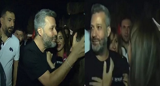 فيديو مثير لفنان لبناني حاول تقبيل مراسلة تليفزيونية على الهواء