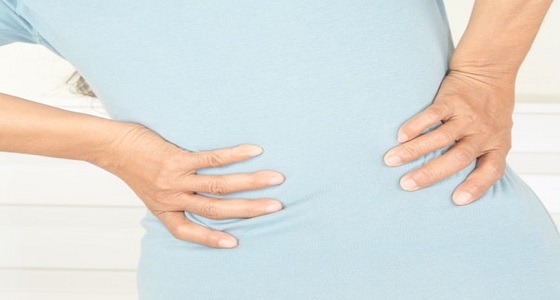 أسباب آلام الظهر في الشهور الأولى من الحمل وطرق العلاج
