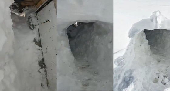 بالفيديو..السكان يحفرون أنفاقًا تحت الثلوج للوصول إلى منازلهم بالعراق