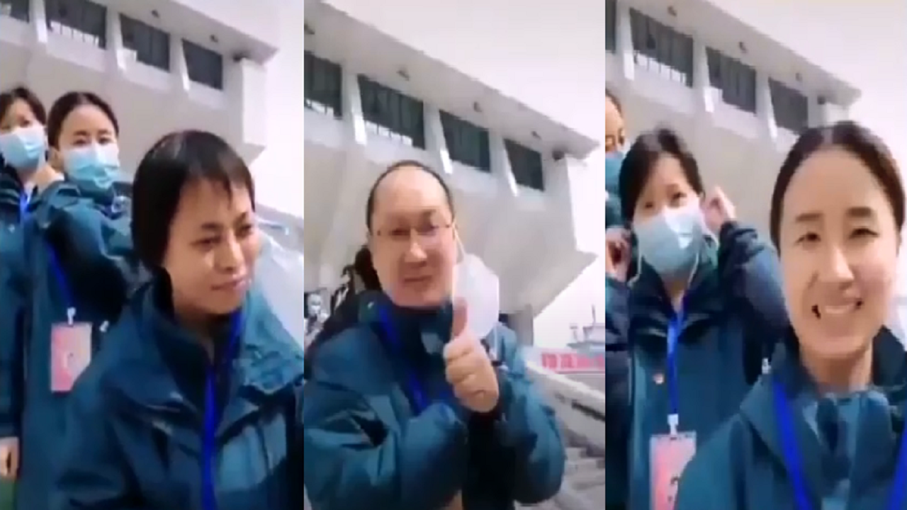 أطباء صينيون يحتفلون بالقضاء على كورونا بخلع الكمامة