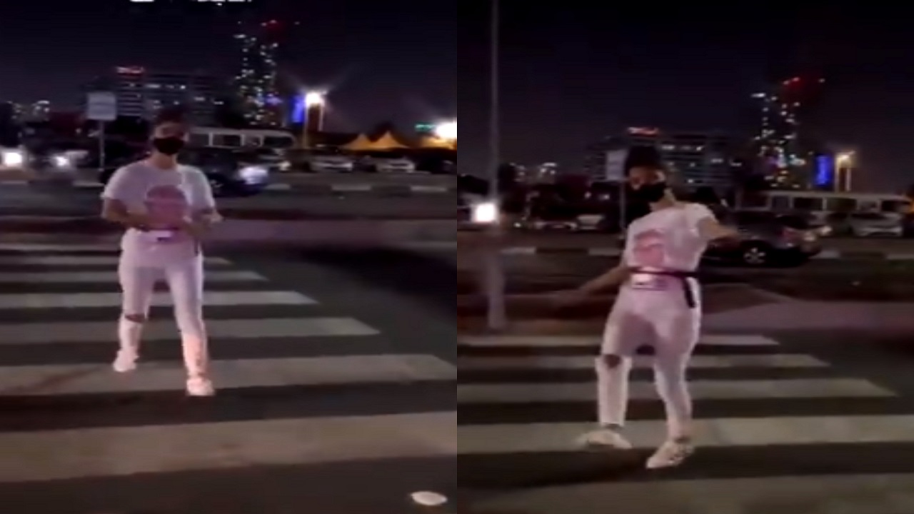 بالفيديو.. فتاة بلباس غير محتشم ترقص وسط الشارع