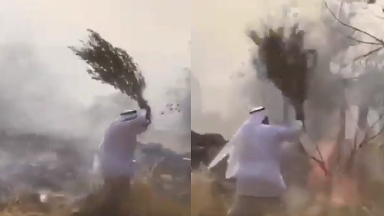 بالفيديو.. مواطن يحاول إخماد حريق جبل عمد