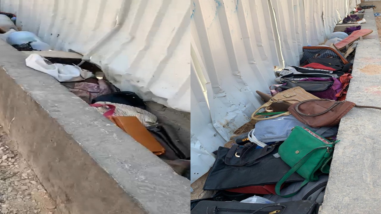 فيديو يرصد حقائب وملابس نسائية كثيرة ملقاه في شارع عام بحي البديعة