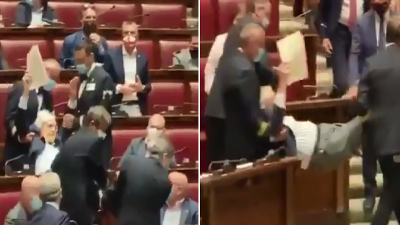 بالفيديو.. نائب في البرلمان الإيطالي رفض ارتداء الكمامة فألقاه النواب خارج القاعة