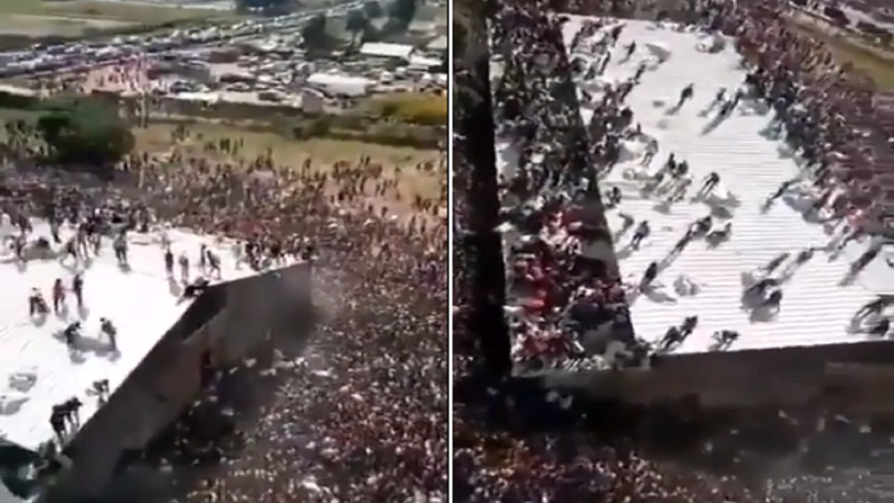 بالفيديو.. مشهد صادم لهجوم مئات الأشخاص على مستودع للمواد الغذائية
