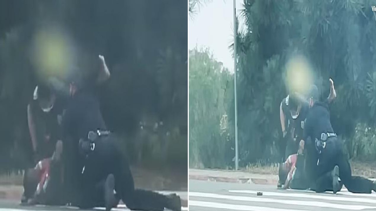 شاهد.. شرطيان يعتديان بوحشية على رجل لتبوله في الشارع