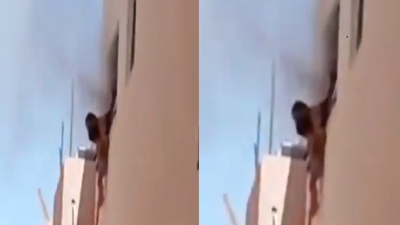 بالفيديو.. أب ينقذ أولاده برميهم من النافذة بعد اندلاع حريق