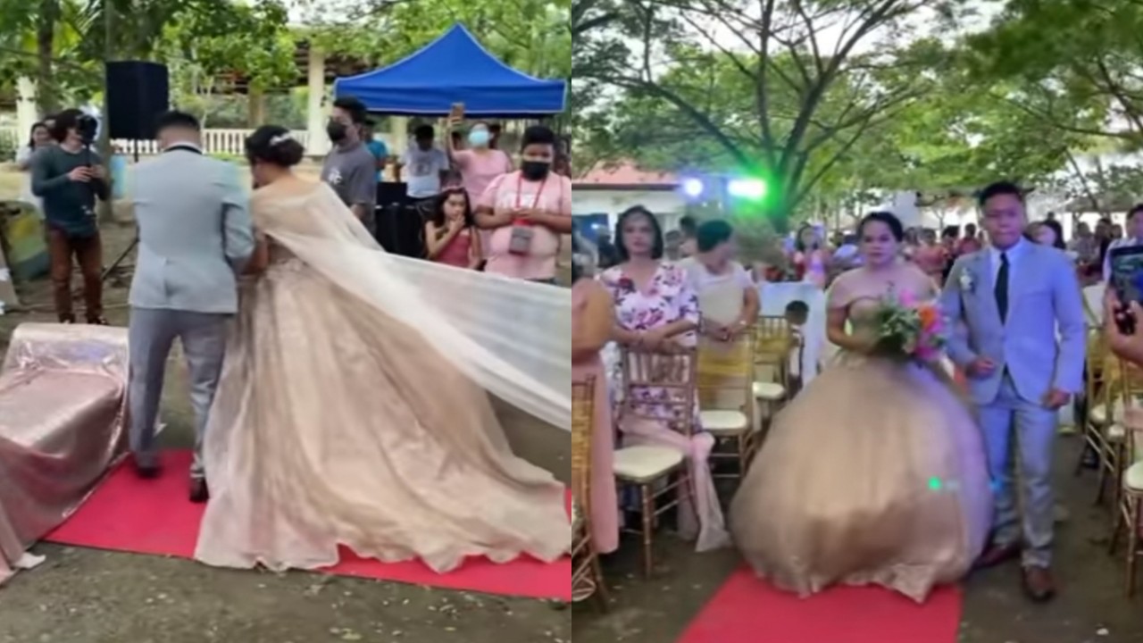 بالفيديو.. شاب يختبئ أسفل فستان زفاف عروس بسبب الرياح