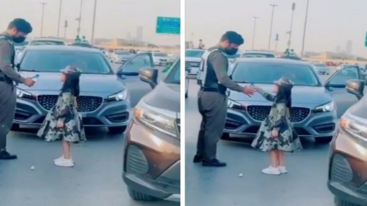 شاهد.. طفلة تلقي التحية العسكرية على أحد رجال المرور وتعطيه زجاجة مياه