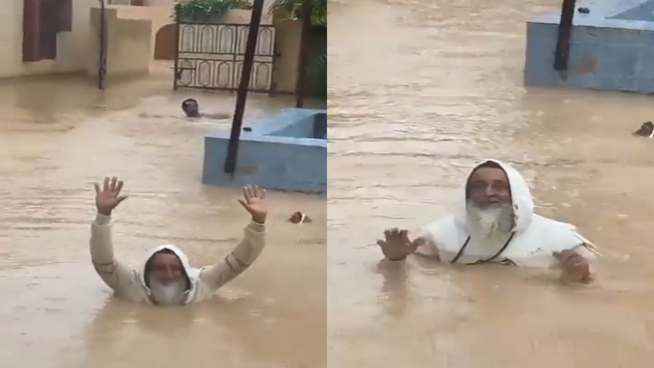 بالفيديو.. مسن عماني يسبح في مياه غمرت منزله بعد إعصار شاهين