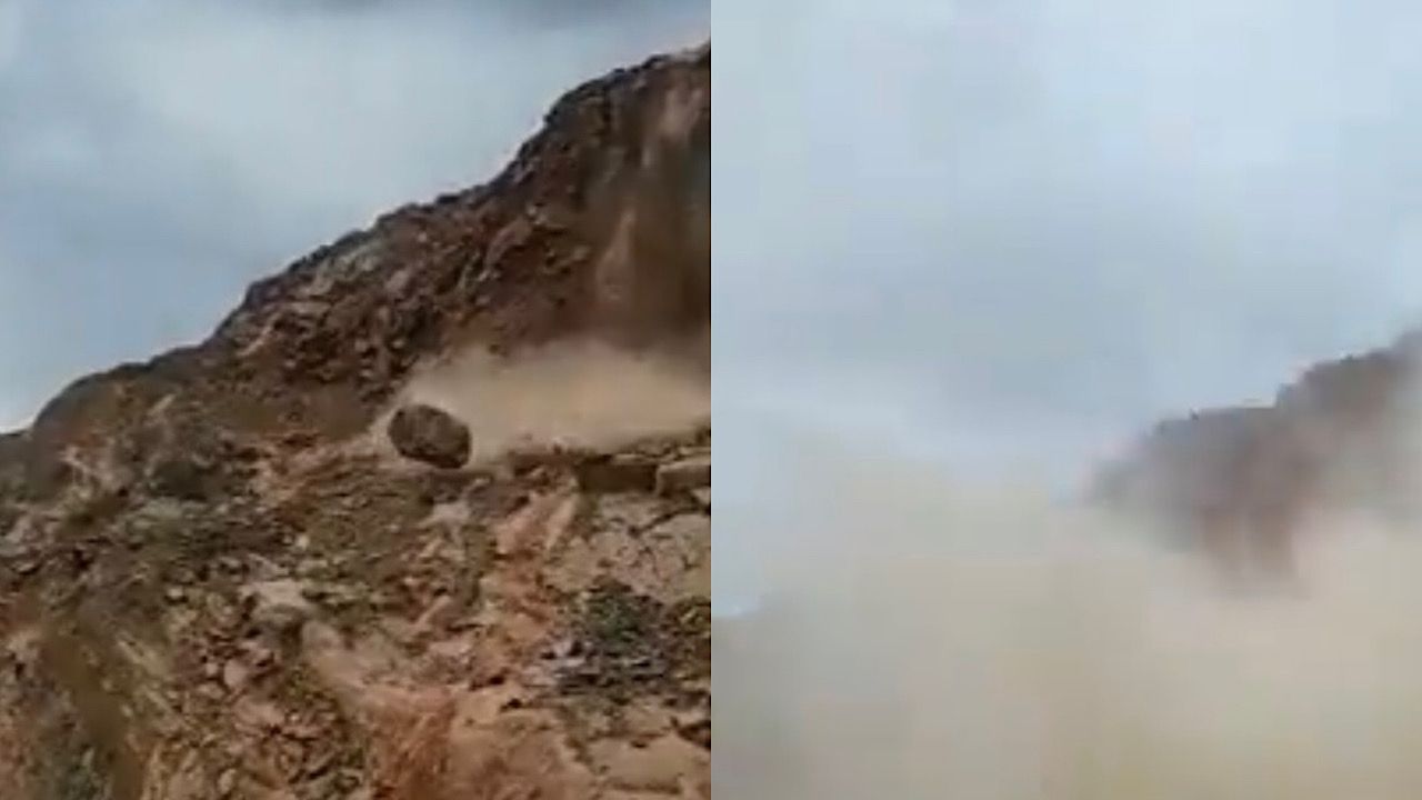 بالفيديو.. مصور‬⁩ ينجو بأعجوبة خلال التقاطه فيديو من انهيار صخرة وقت الأمطار