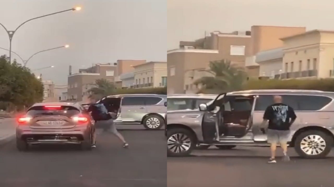 شاب يعترض سيارة فتاة ويحاول كسر الزجاج.. فيديو