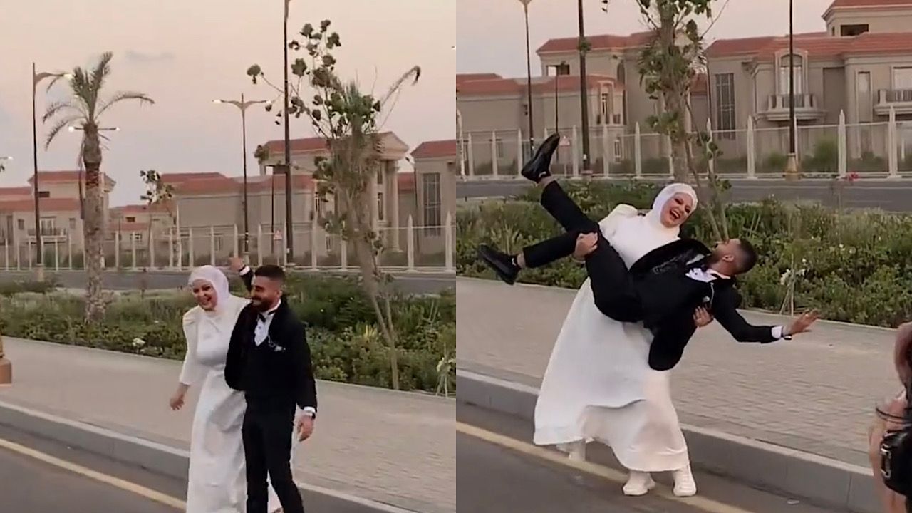 عروس مصرية تحمل زوجها بانسيابية وتلتقط الصور التذكارية يوم زفافها .. فيديو