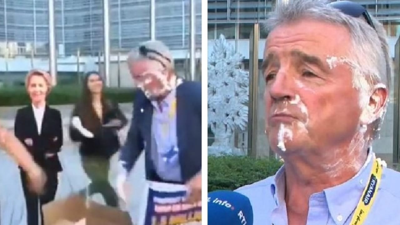 نشطاء البيئة يلطخون وجه مايكل أوليري بالكيك أثناء تواجده في بلجيكا .. فيديو