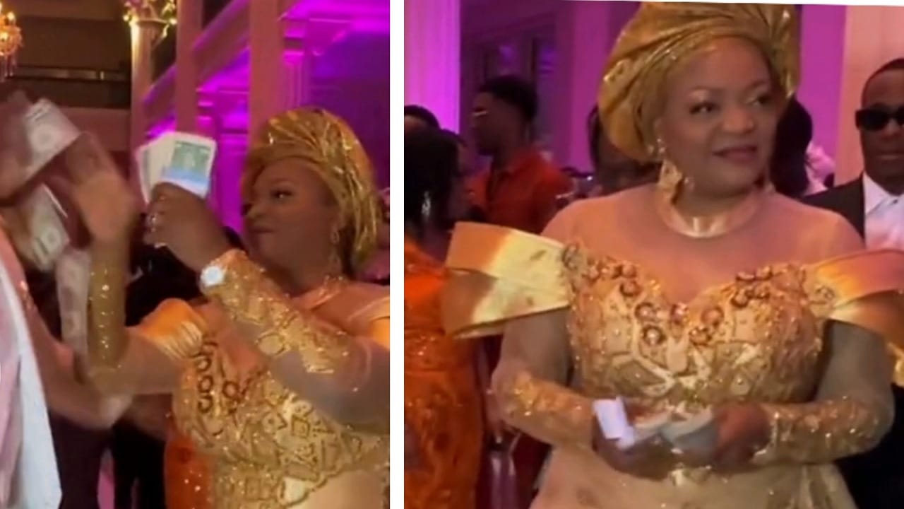 سيدة أوغندية تلقي رزم من الدولارات على العريس..فيديو