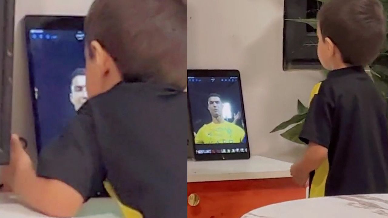 طفل يقبّل رونالدو خلال مشاهدته على الجوال ويقلد حركات احتفاله بسعادة .. فيديو