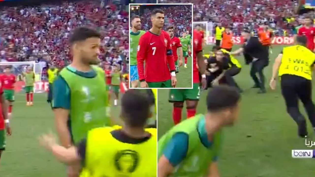 رجل أمن يتسبب في إصابة لاعب البرتغال بعد المباراة .. فيديو