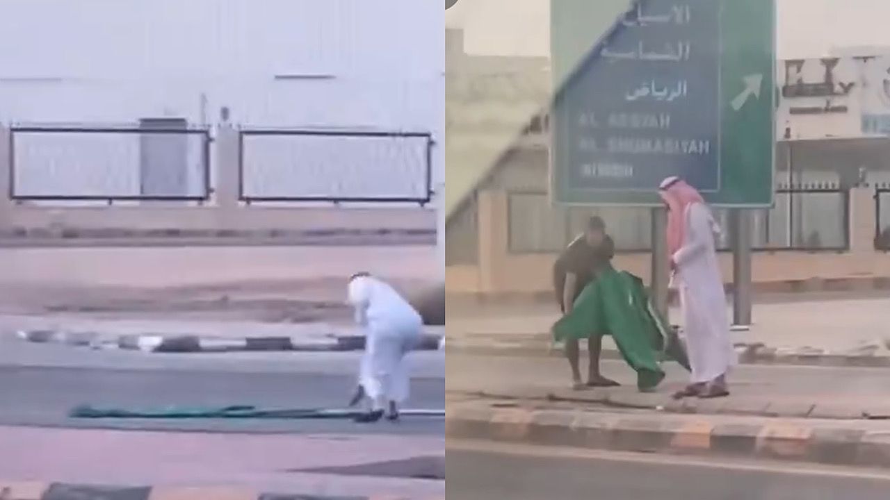 فزة رجل وسط الطريق بعدما شاهد الأعلام على الأرض .. فيديو