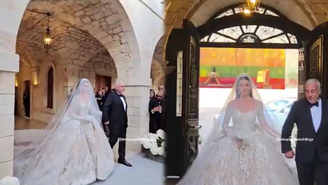 إطلالة عروس ابن المصمم إيلي صعب تخطف الأنظار في حفل زفافهما ..فيديو